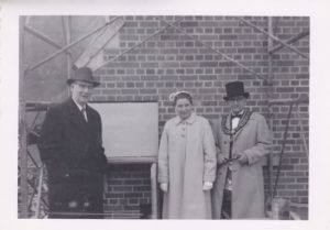 L to R: John B. Tomhave (Past Grand Master), Grace Aker (Grand Matron) and George R. Wilson (Grand Master) at the cornerstone laying ceremony in November 1957.